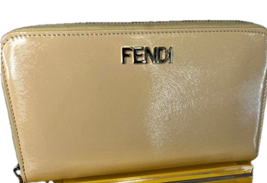 Authentic Fendi Wind Fastener Wallet In Yellow
